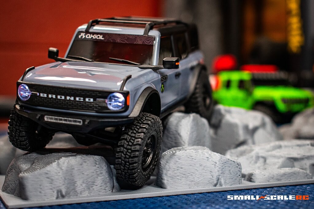 RC Bronco off-road vehicle on rocky surface for scale model enthusiasts.