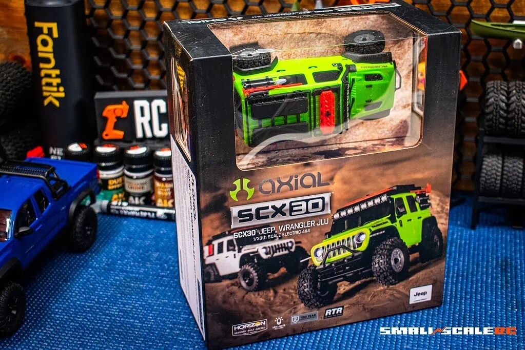 RC Axial SCX10 Jeep Wrangler model in packaging with accessories.