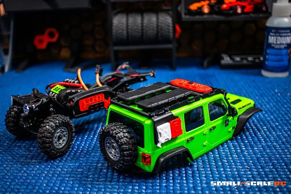 RC off-road vehicle with detailed design and rugged tires for outdoor adventures.