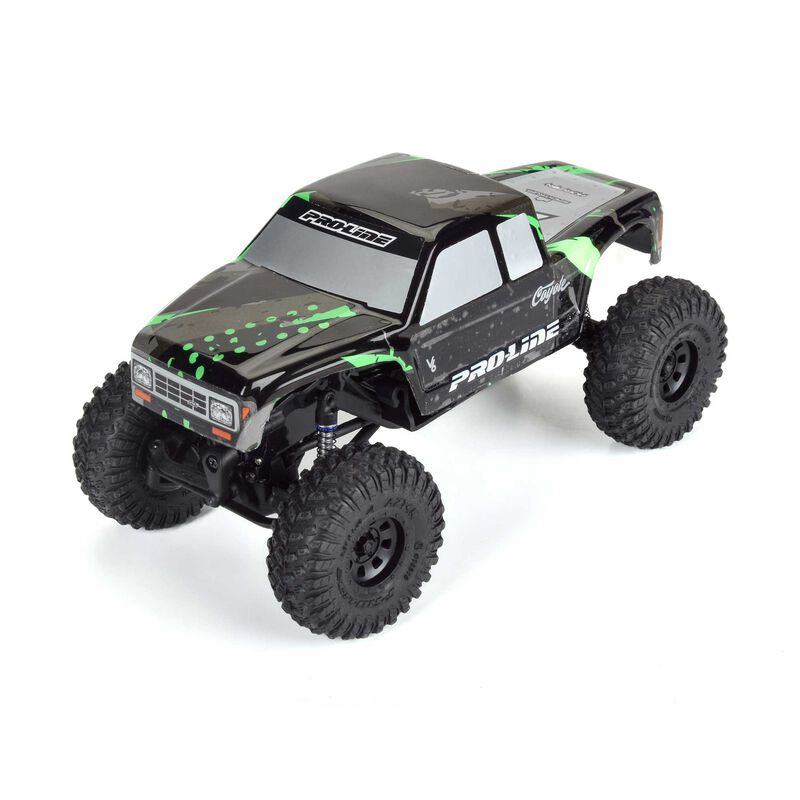 Remote control off-road truck with large tires and detailed body.