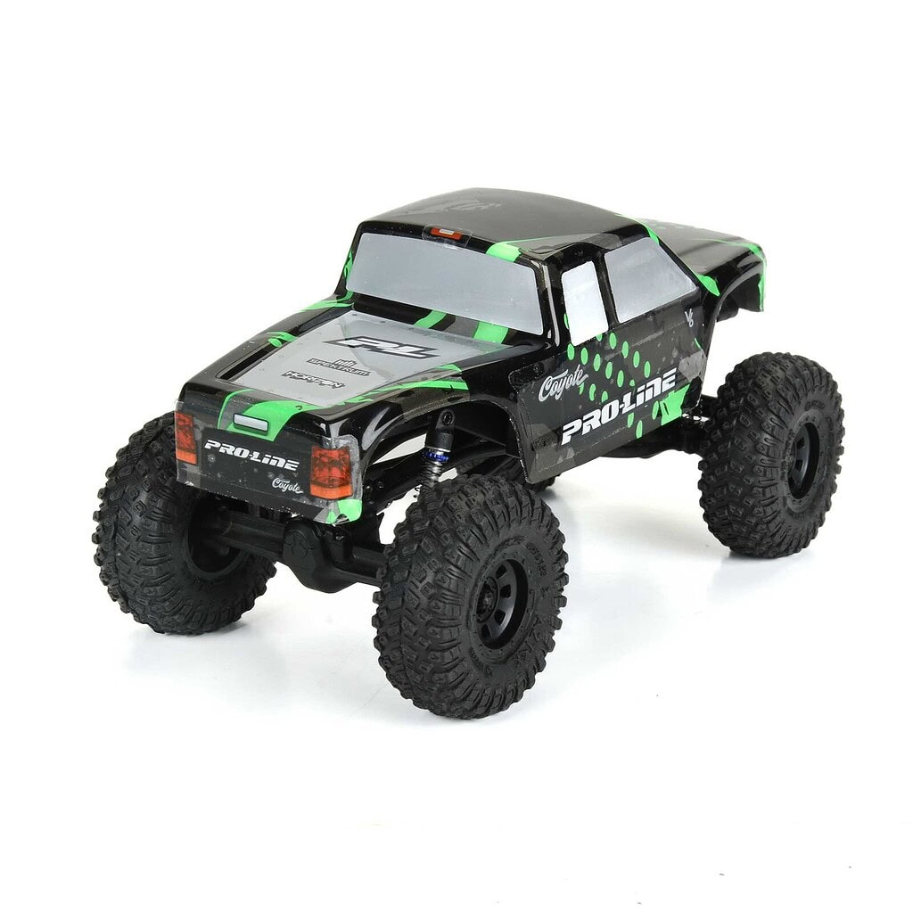 High-performance small-scale RC off-road truck with rugged tires and durable design.