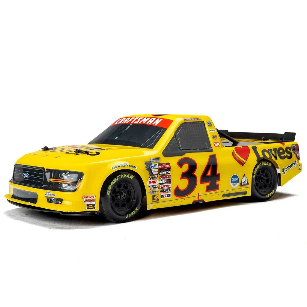 RC race car with yellow paint and racing decals, number 34, designed for remote control racing.