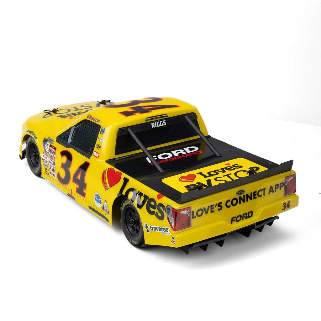 RC race car with bright yellow paint and racing decals.