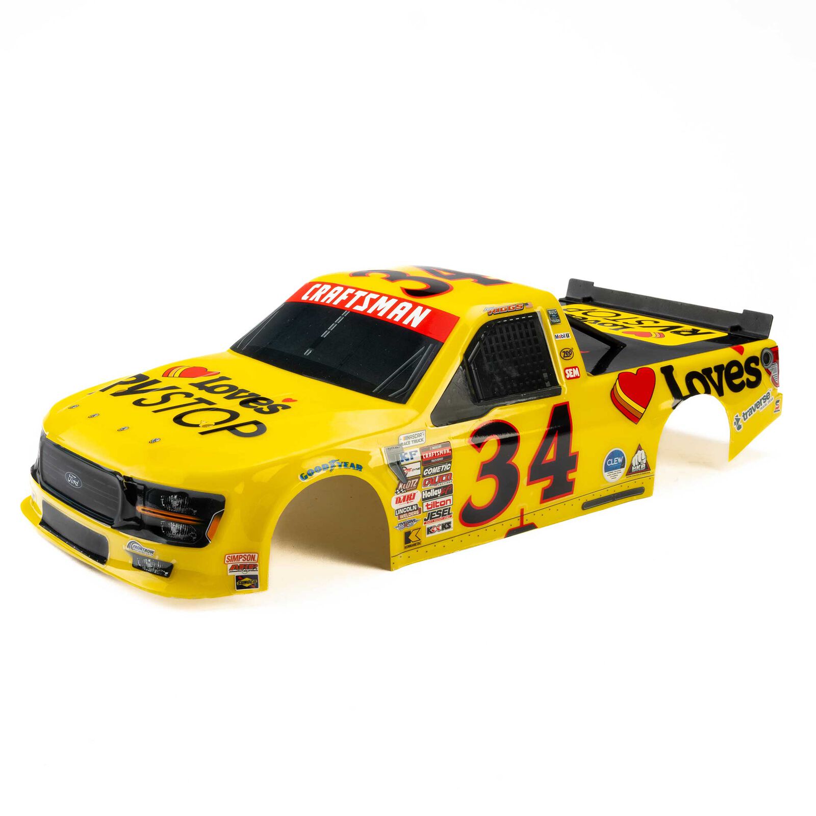 RC race car body with yellow paint and sponsor decals.