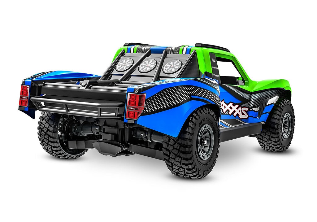 Blue and green Traxxas Mini Slash RC truck with rugged tires and sporty design.