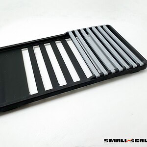 Adjustable RC car ramp for small-scale models, ideal for hobbyists and racing enthusiasts.