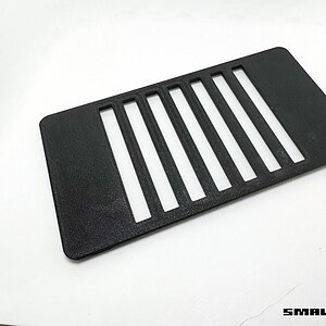 Black plastic vent cover with multiple slats for small-scale RC models.